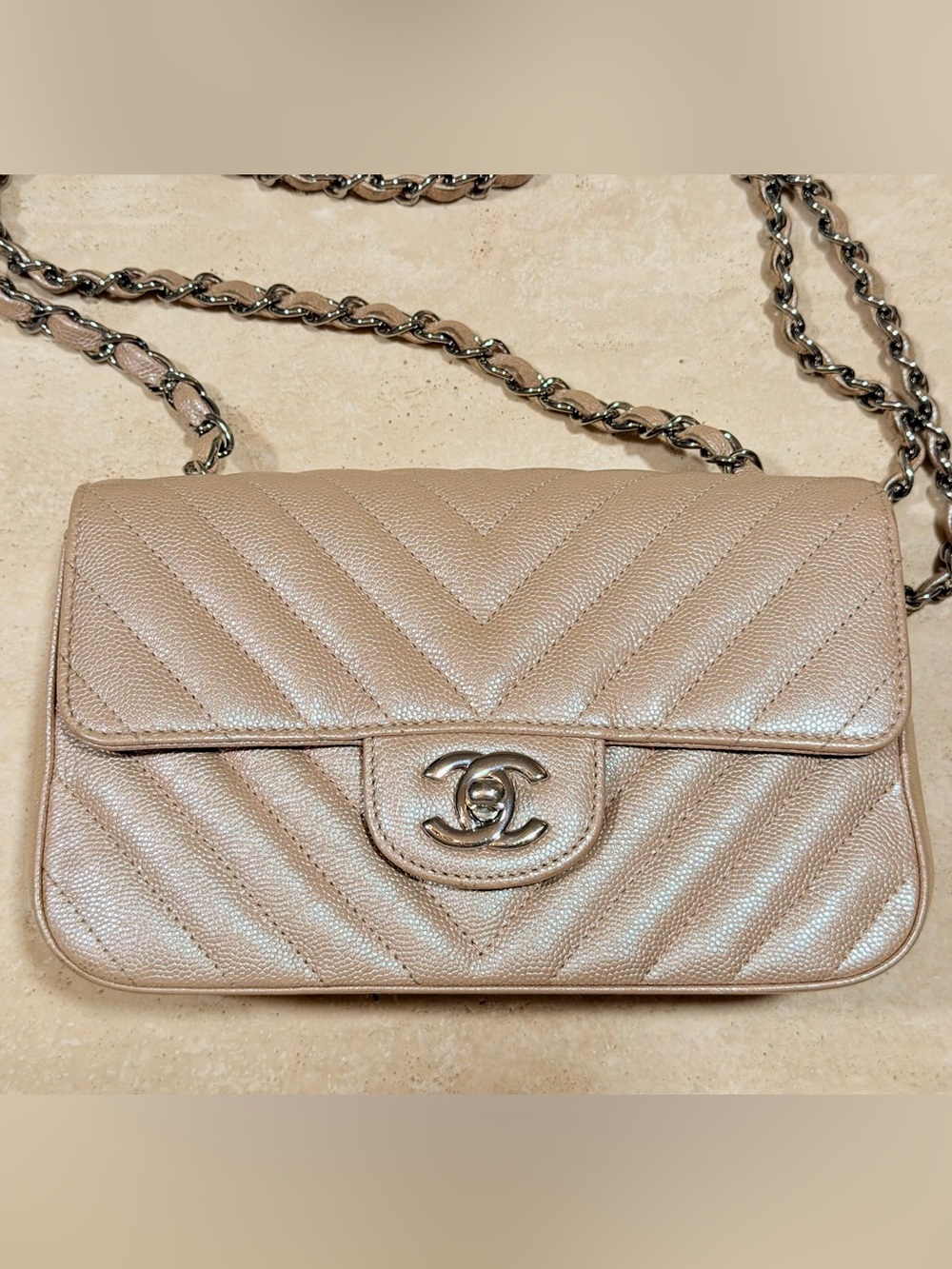 CHANEL Iridescent Caviar Chevron Quilted Mini Flap Light Gold Rose Silver Chain